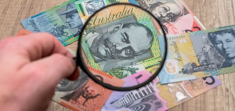 Picture of Australian money and magnifying glass Picture of Australian money and magnifying glass