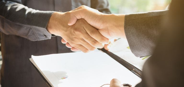 shaking hands after successful interview