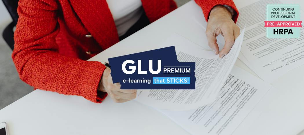 Top down view of a person reviewing employee contracts on their desk. In the foreground is the logo for GLU: eLearning that sticks, and a HRPA approval badge.