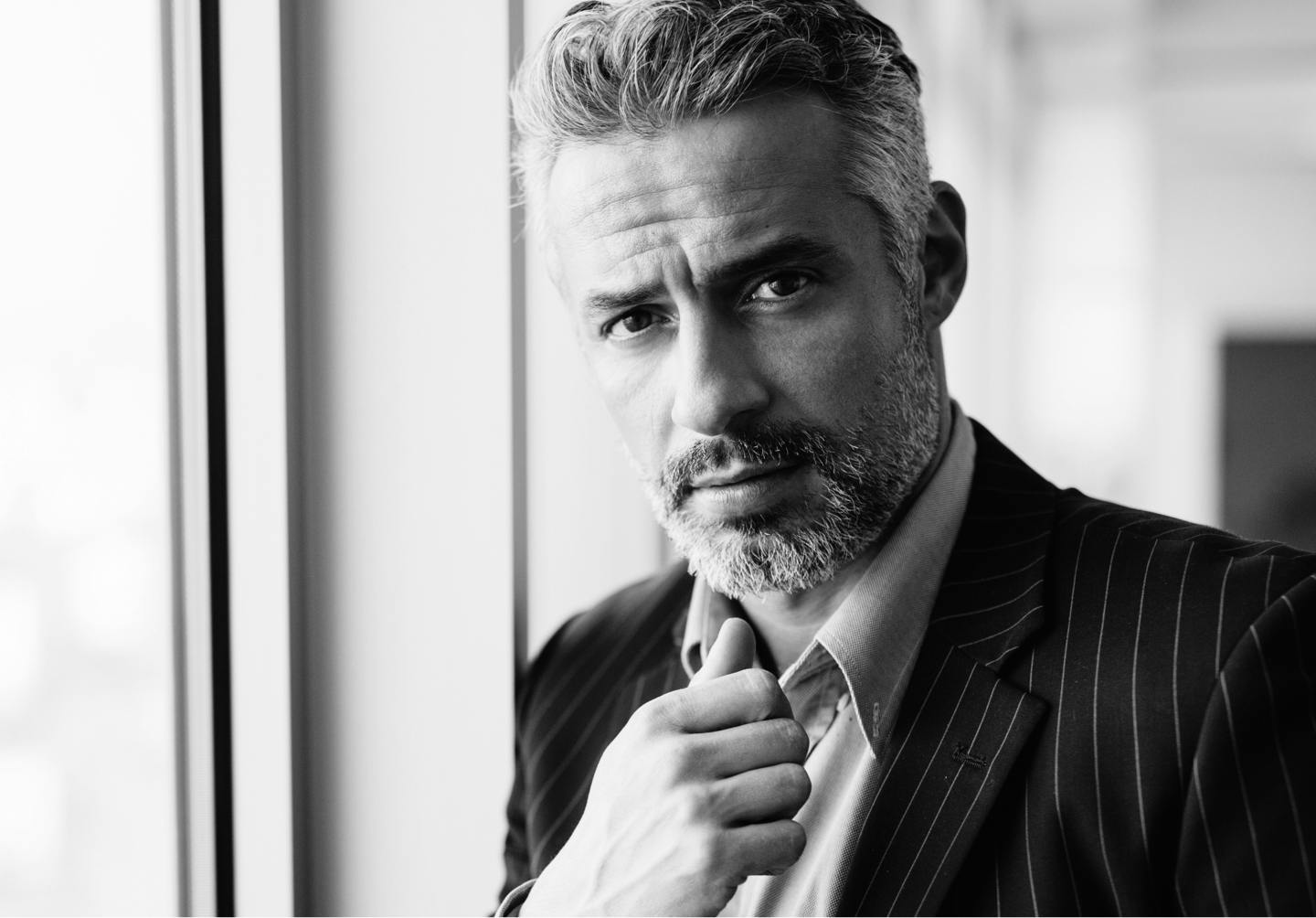 Man in suit with nice hair.