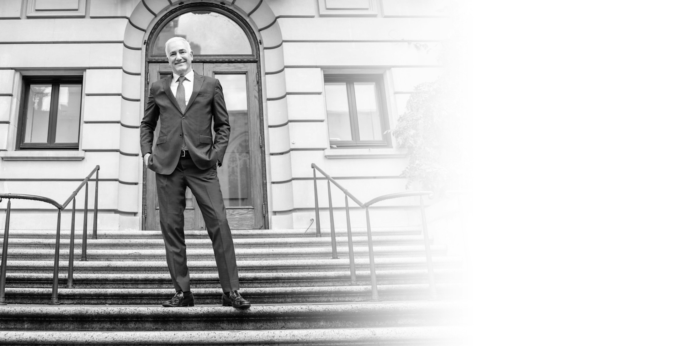 Dr. Alizadeh on the steps of Cosmoplastic Surgery.