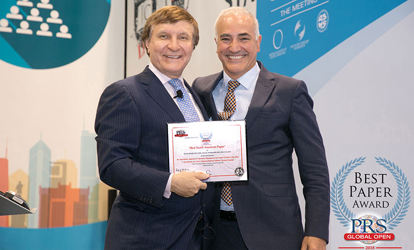 Dr. Alizadeh receiving an award