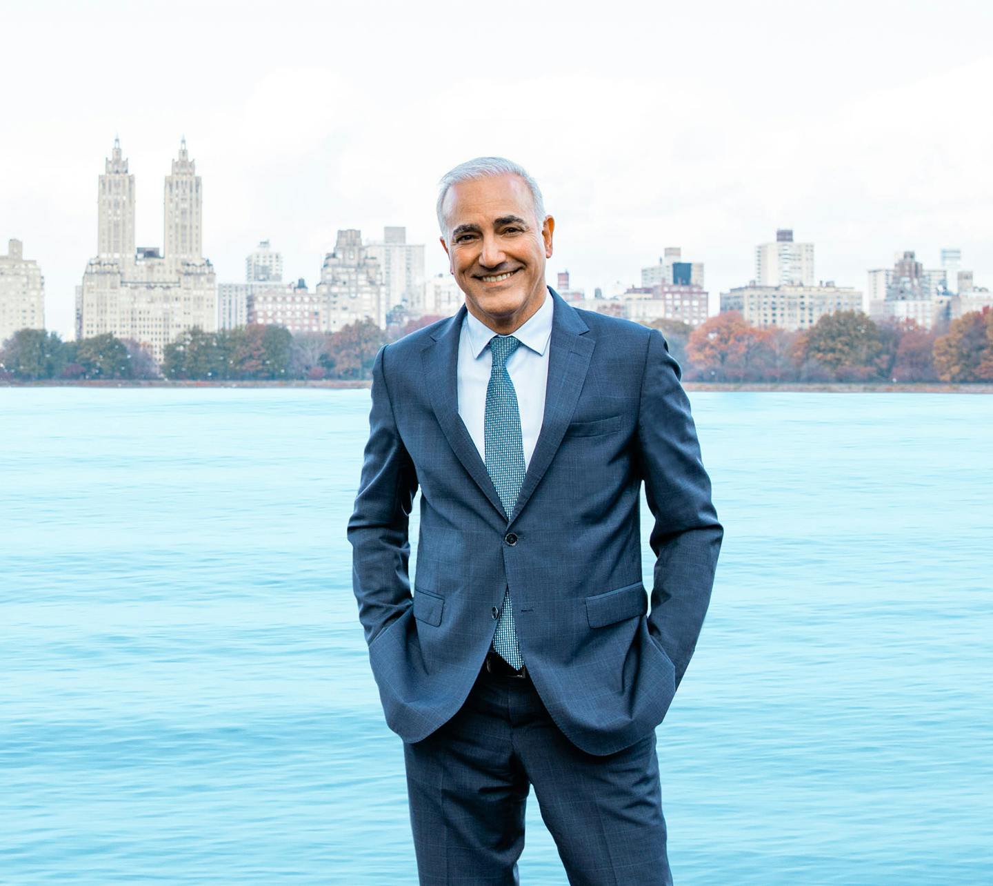 Dr. Alizadeh in front of NYC skyline.