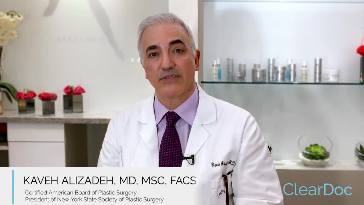Dr. Alizadeh speaking in his office.