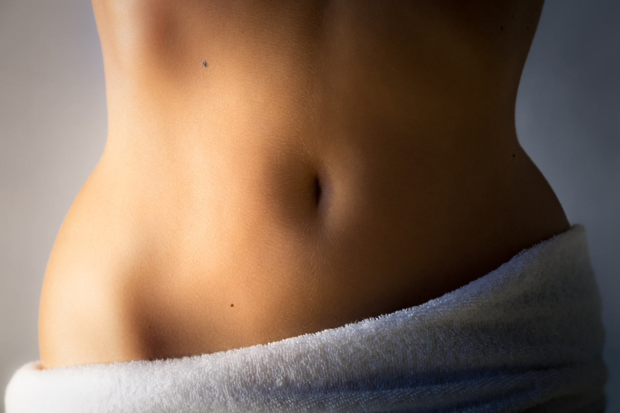 Closeup of a woman's bare stomach.