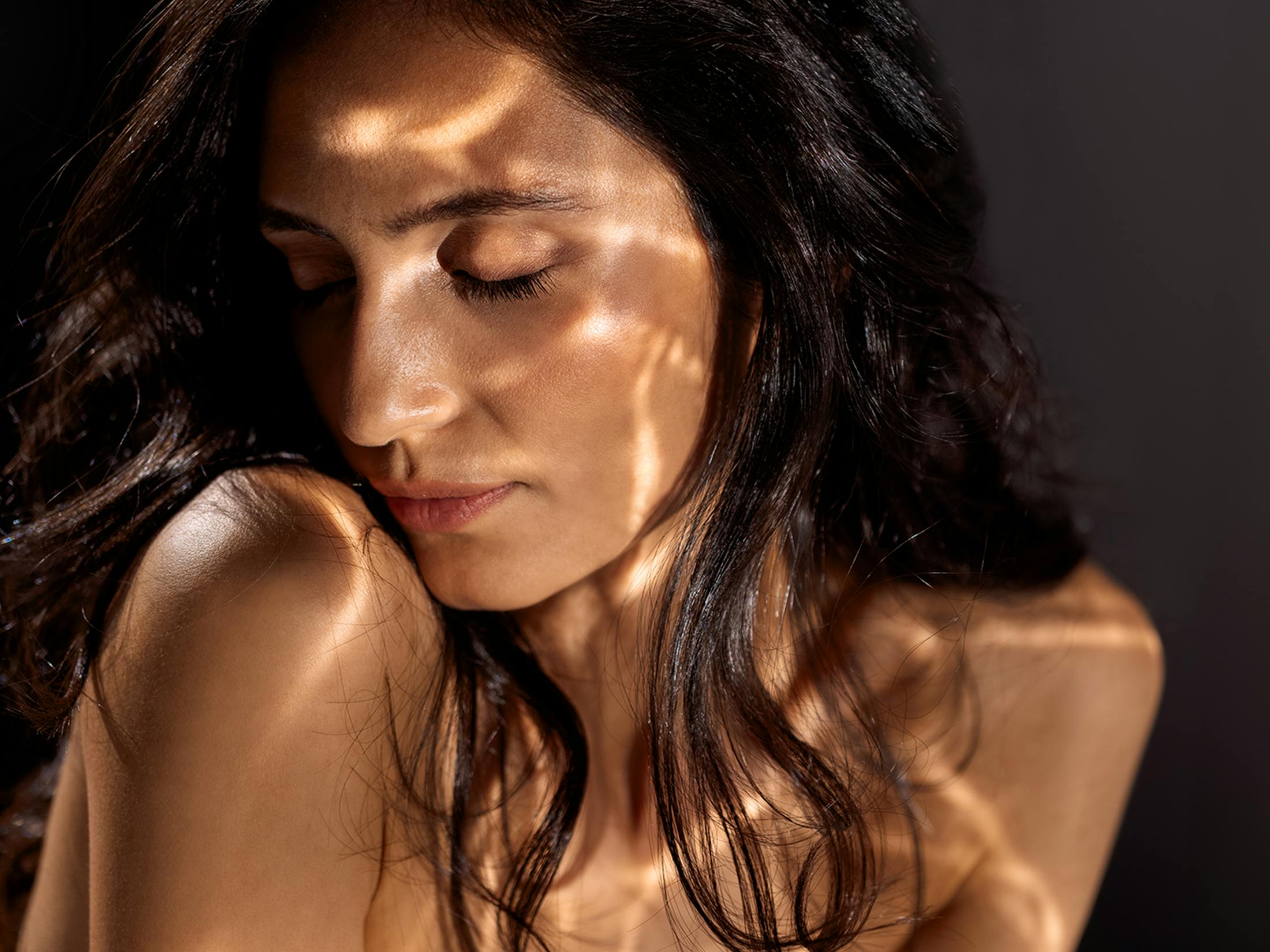 Woman with her eyes closed