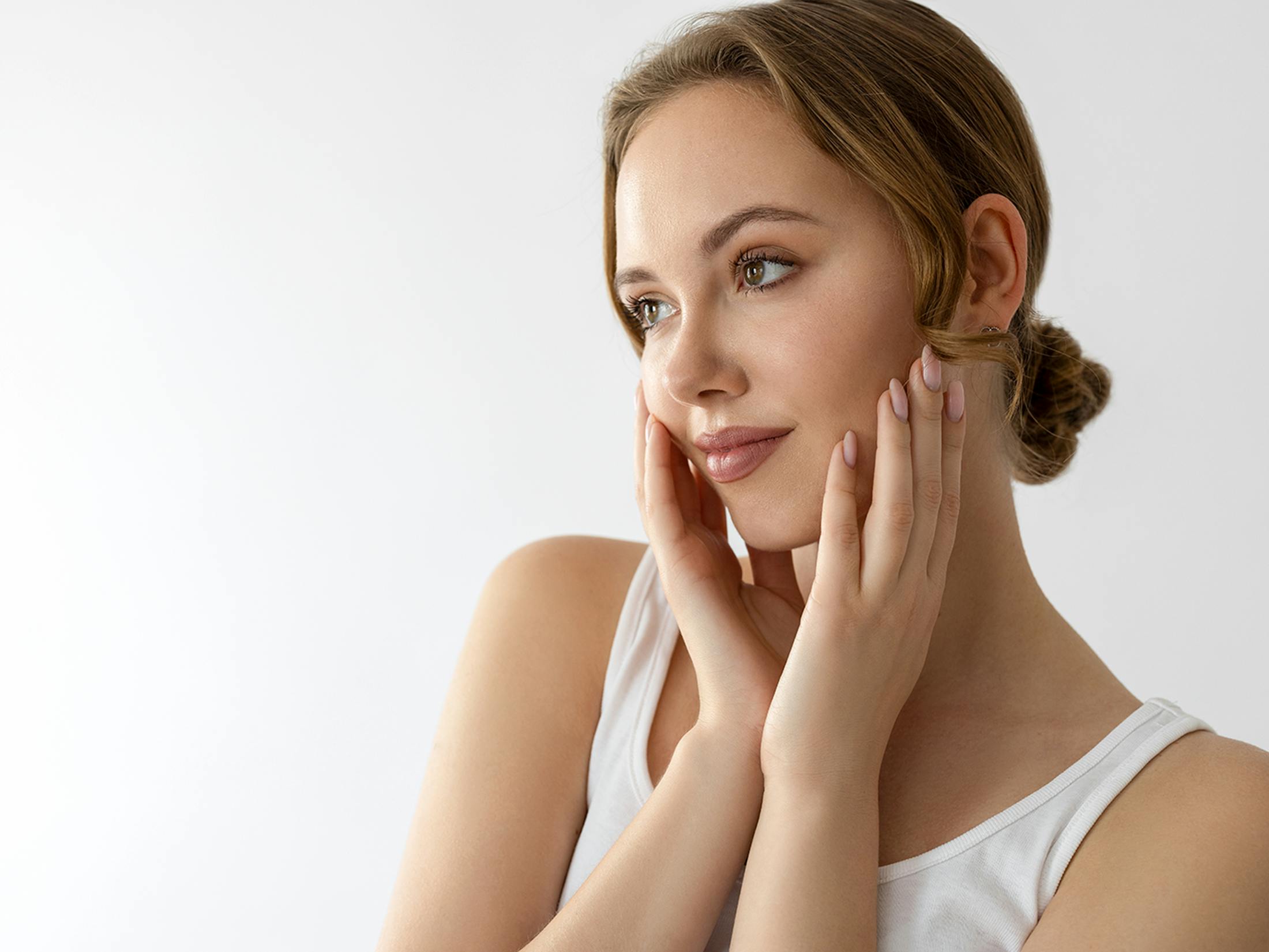 Woman touching her face