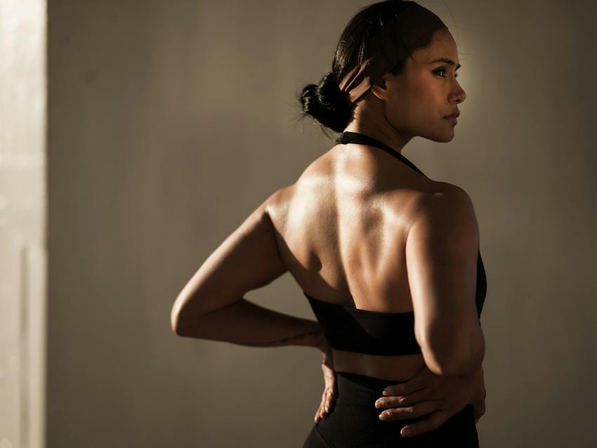 A woman with her hands on her hips