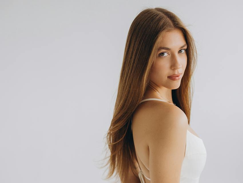 Woman looking over her shoulder