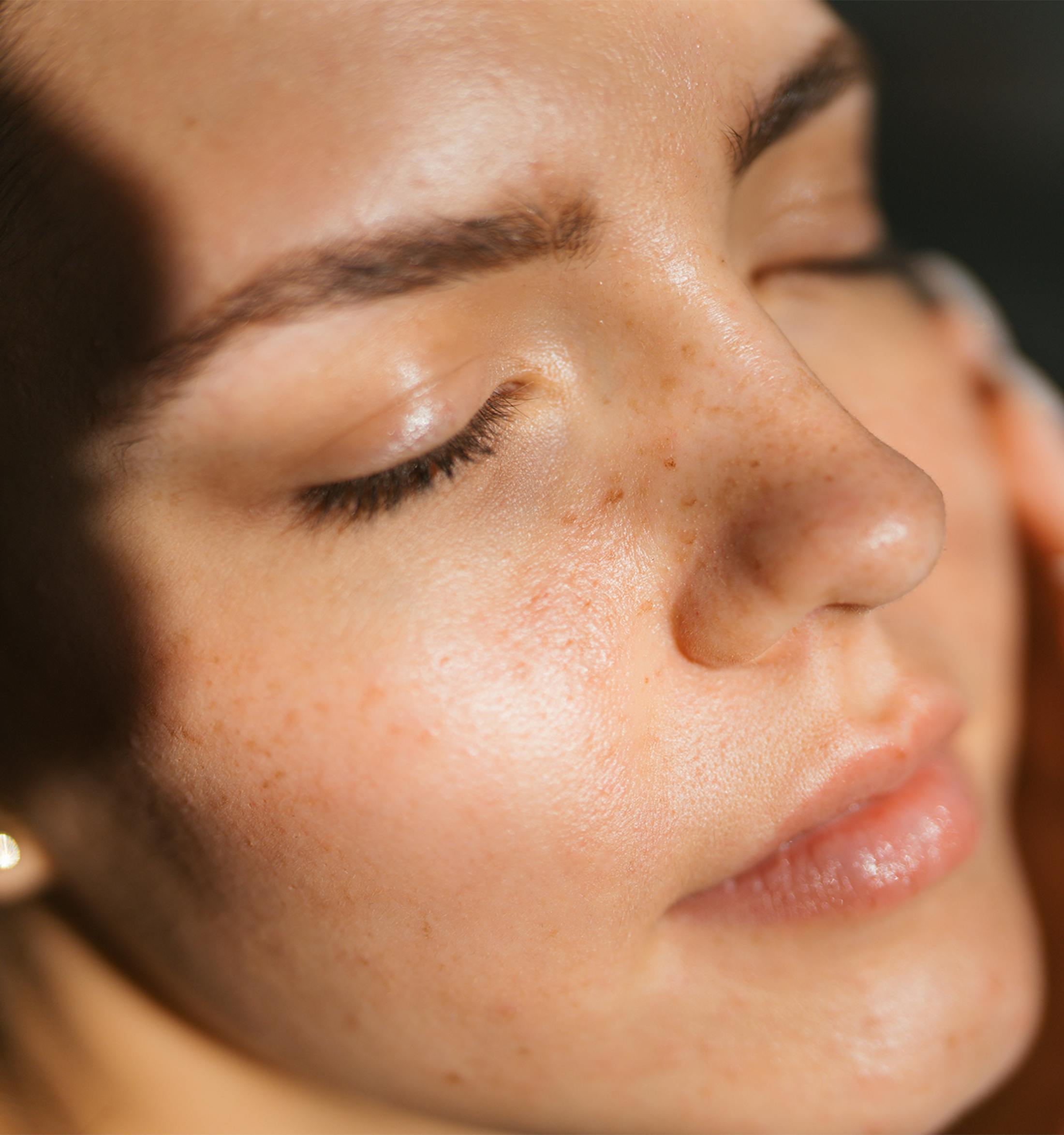Woman with her eyes closed