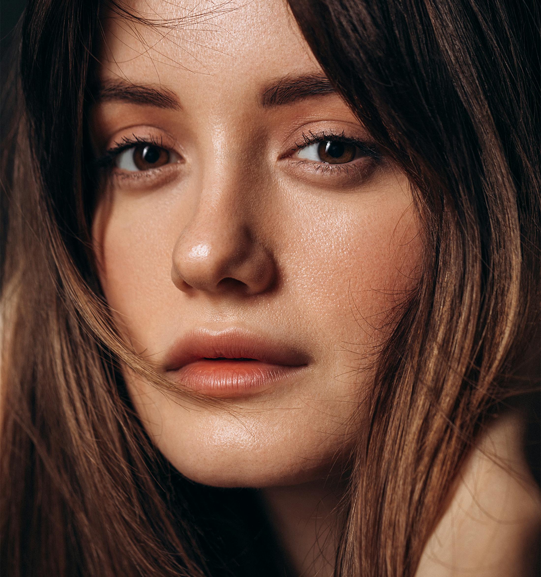 A woman looking at the camera