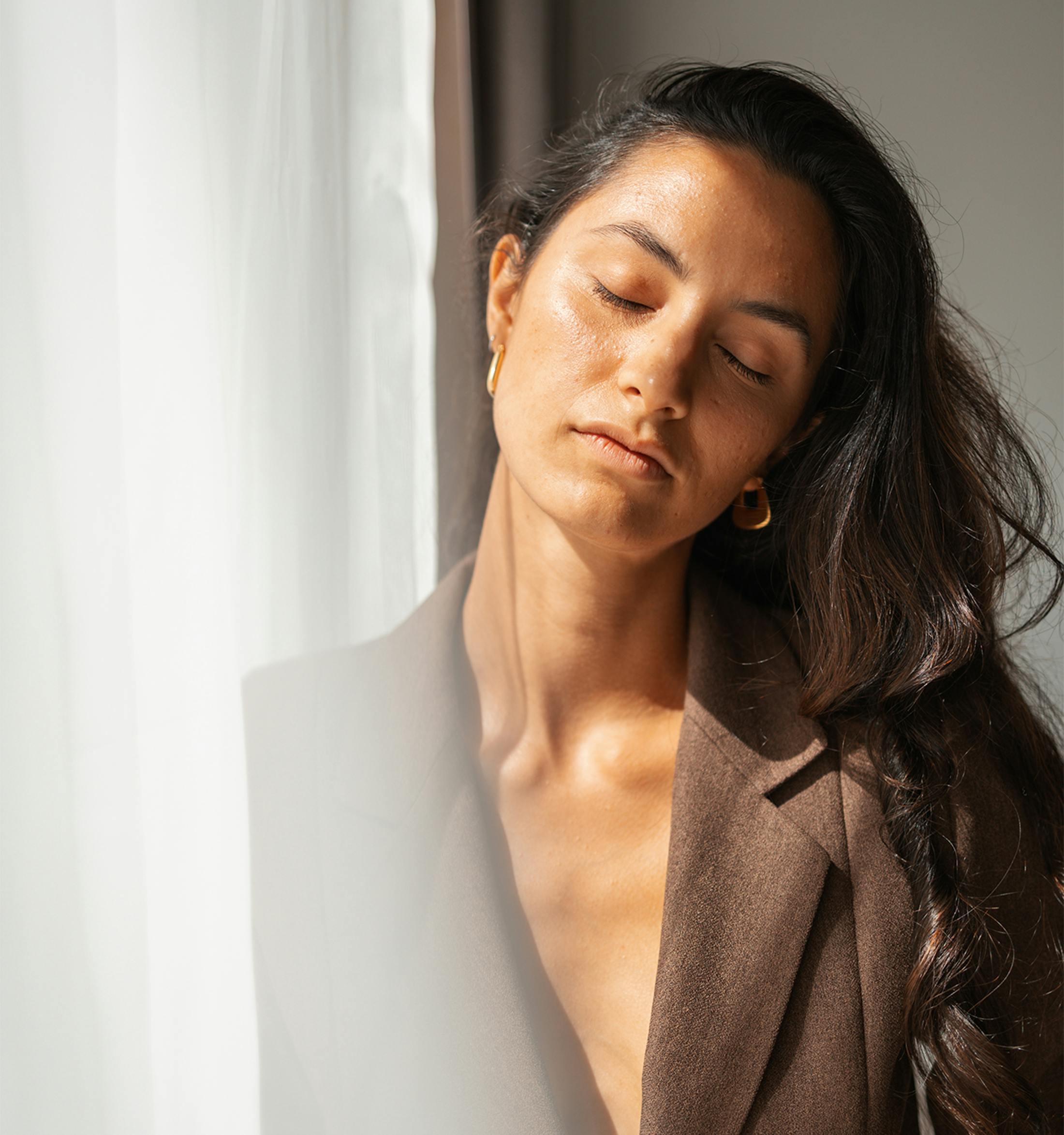 Woman with her eyes closed