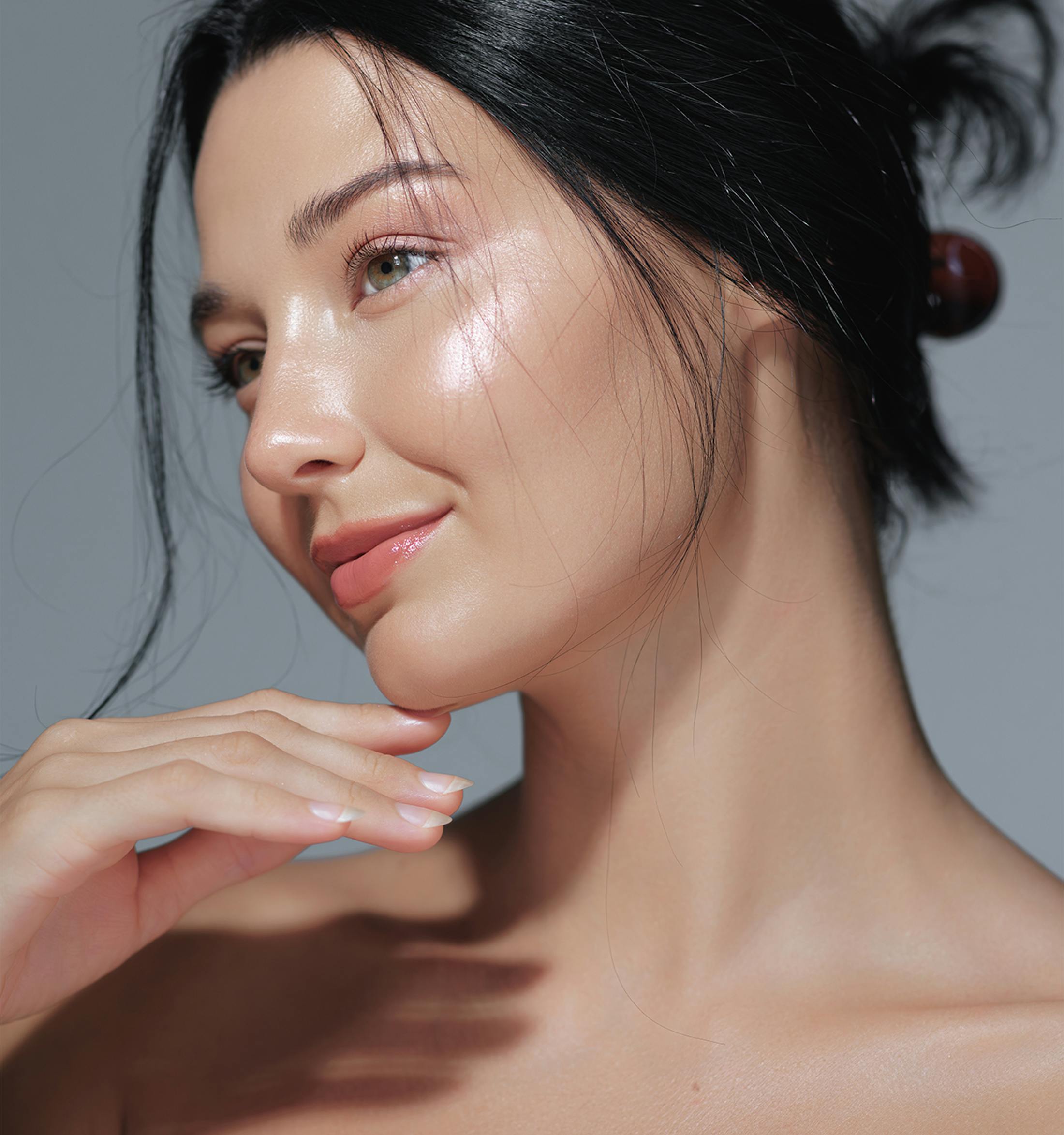 Woman touching her chin