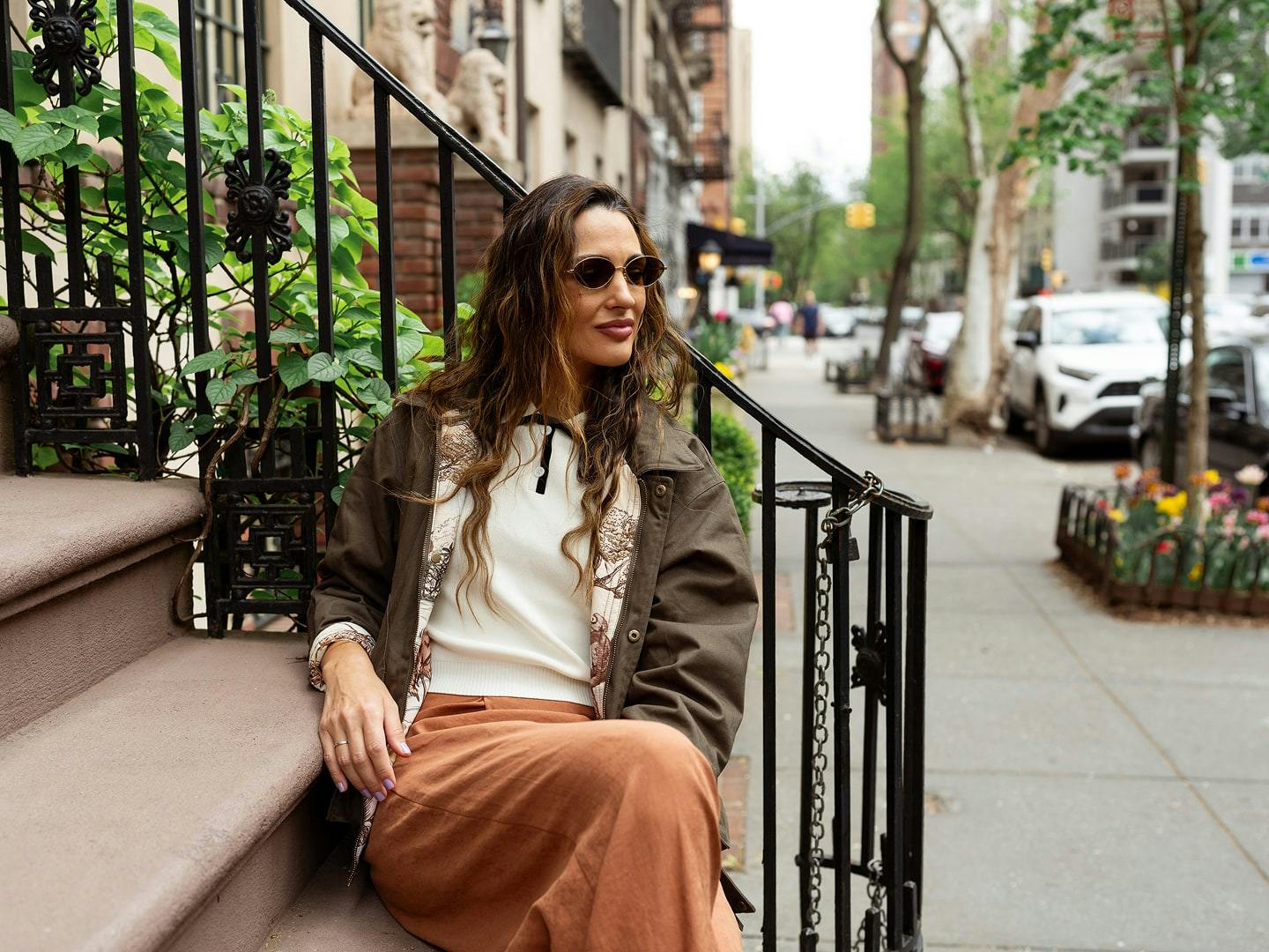 woman sitting on stoop