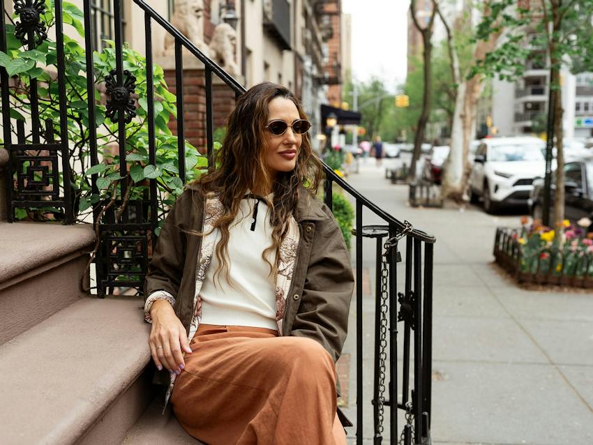 woman sitting on stoop