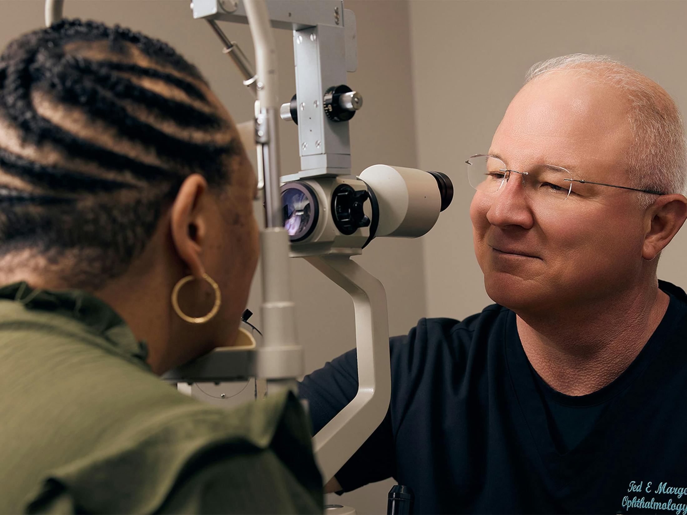 woman and doctor during eye exam