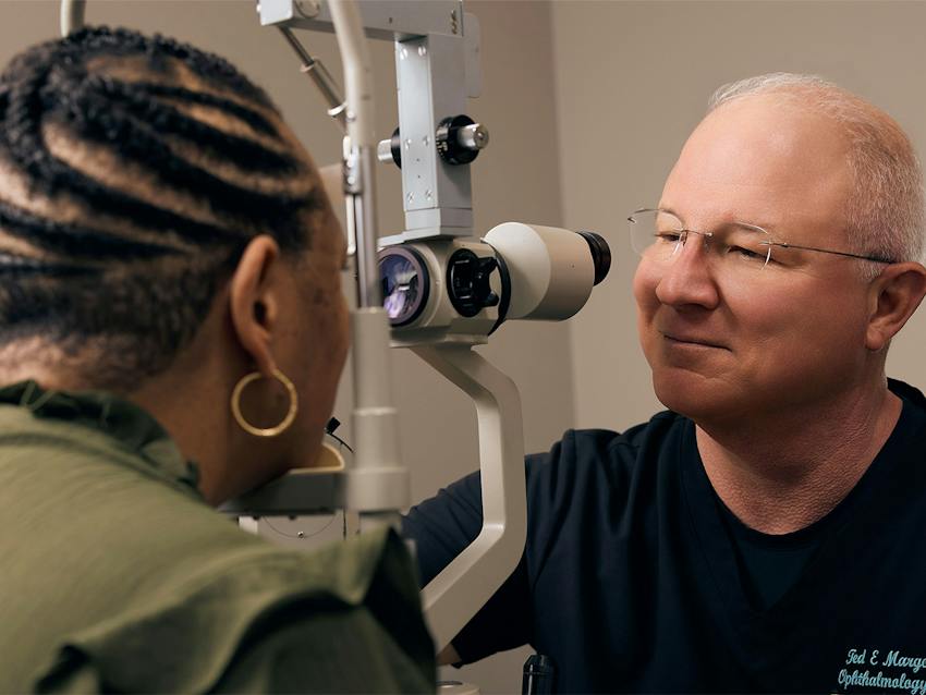 woman and doctor during eye exam