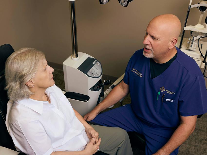 woman and doctor during eye exam