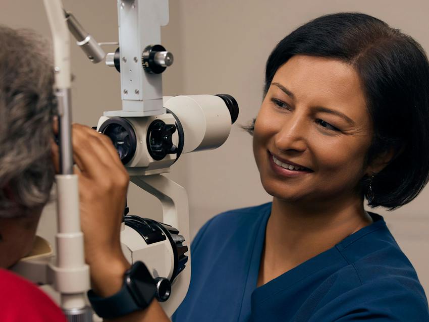 woman and doctor during eye exam
