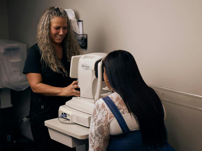 woman and doctor during eye exam