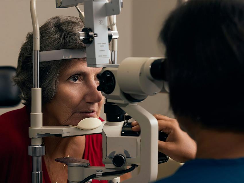 woman and doctor during eye exam