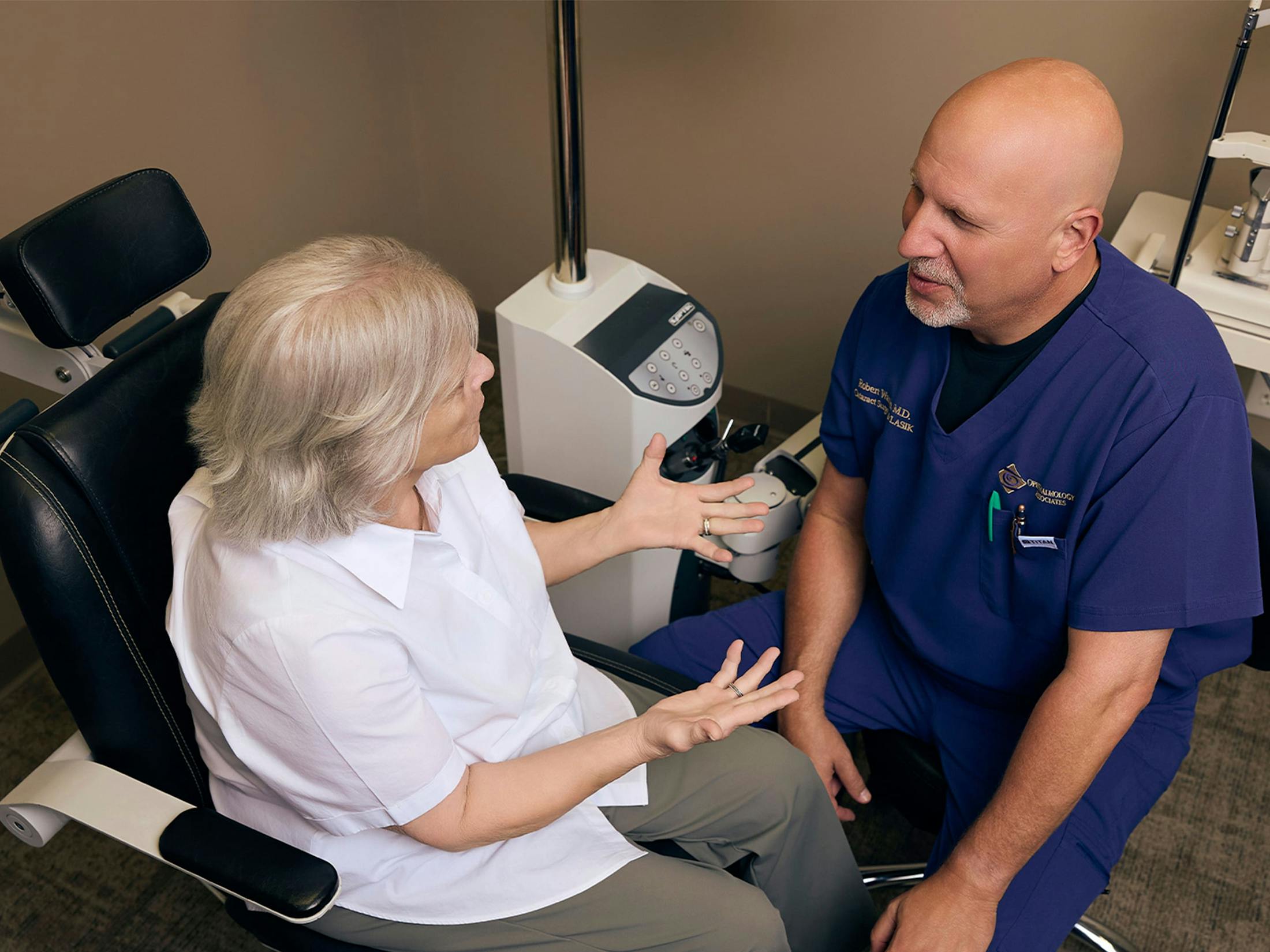 woman and doctor during eye exam