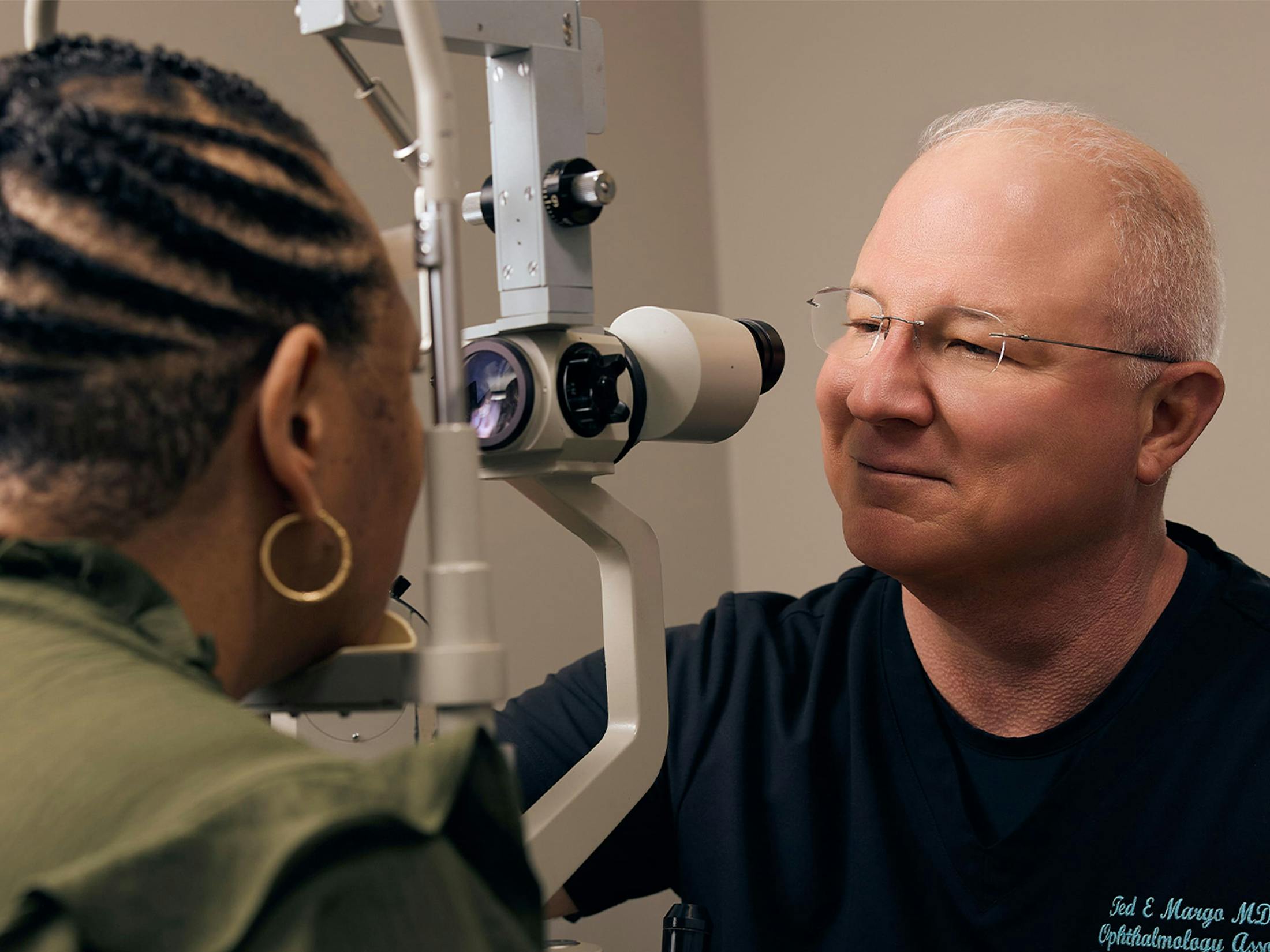woman and doctor during eye exam