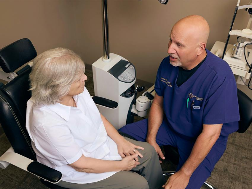 woman and doctor during eye exam