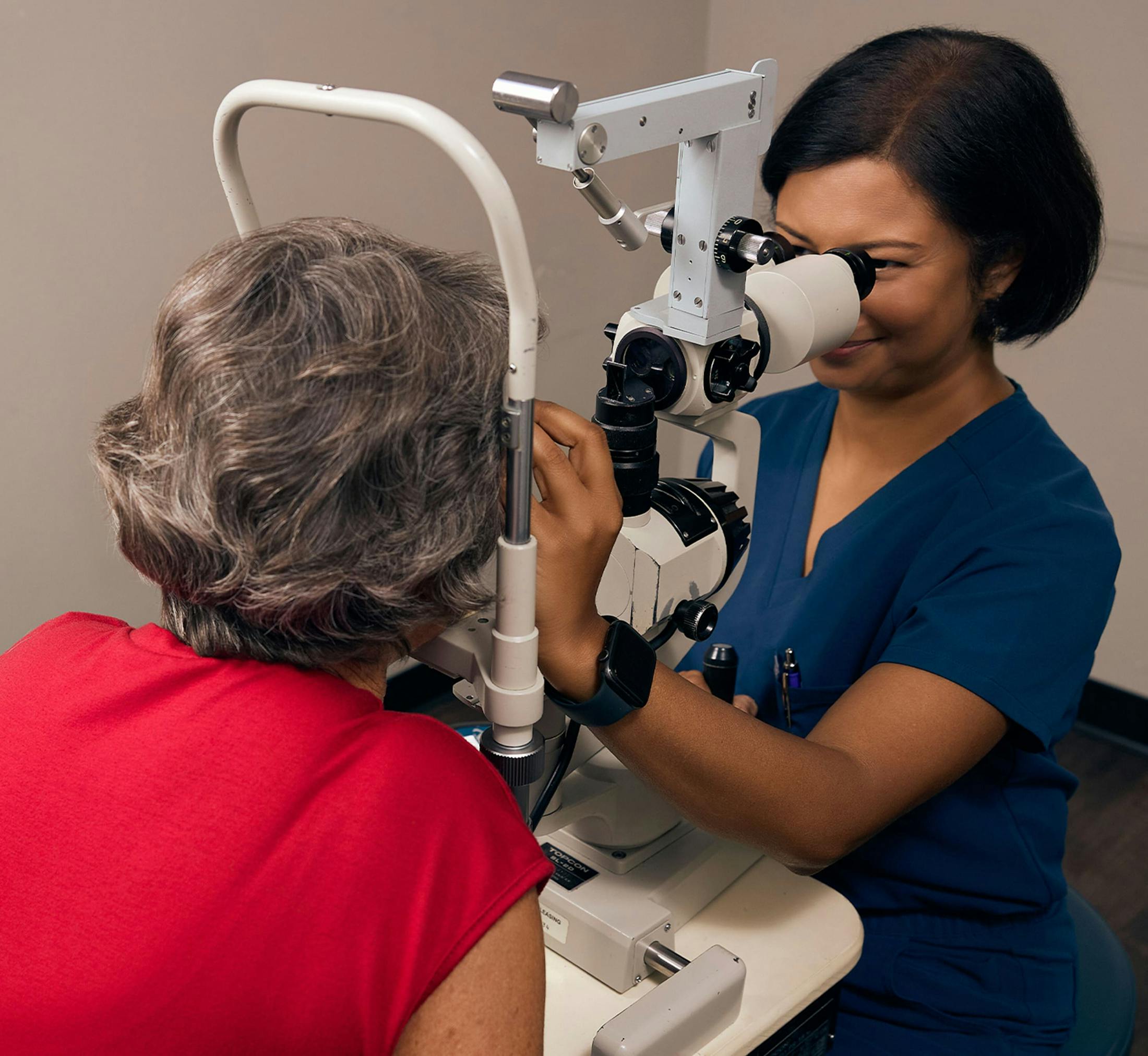 woman and doctor during eye exam