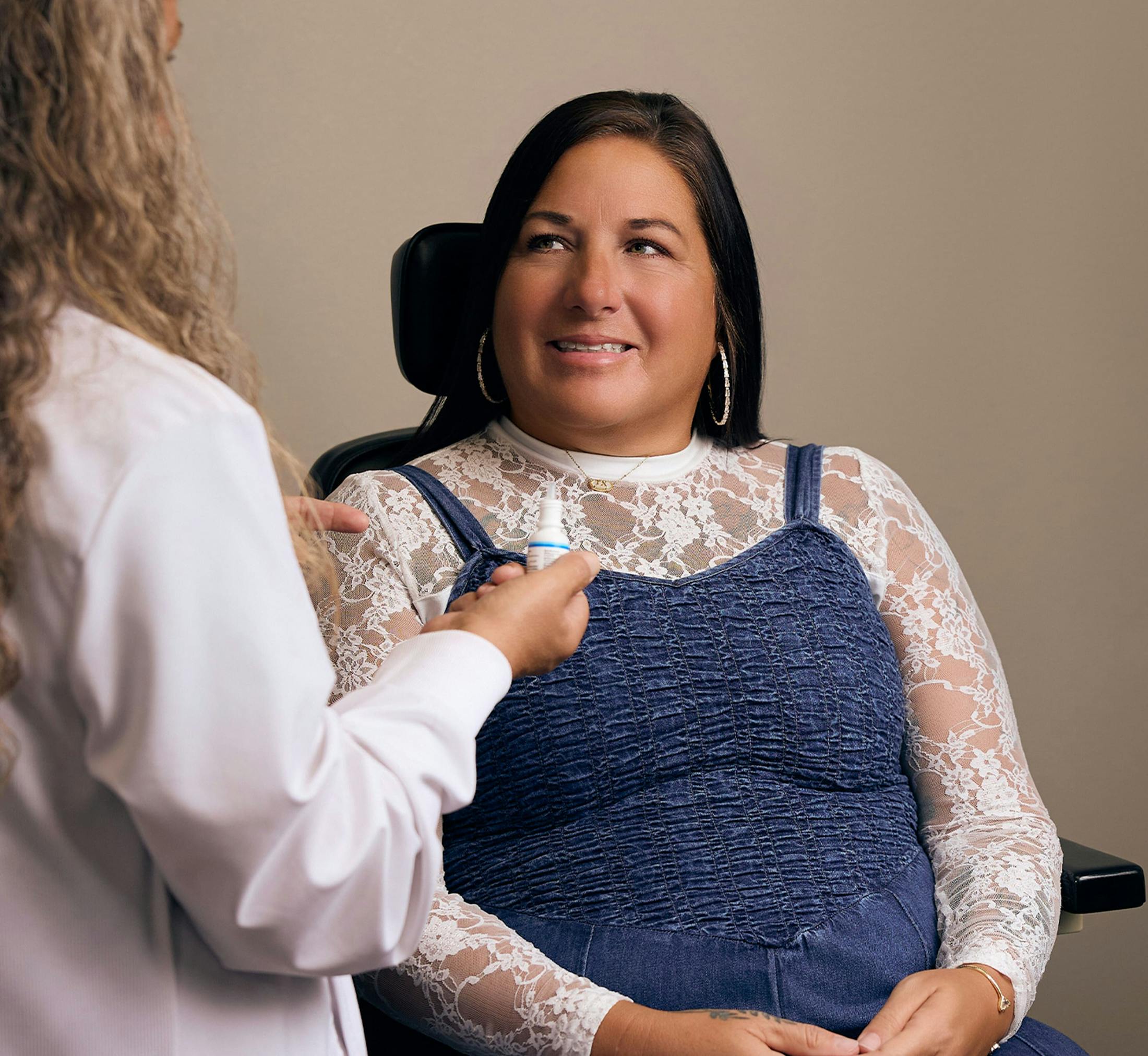 woman and doctor during eye exam