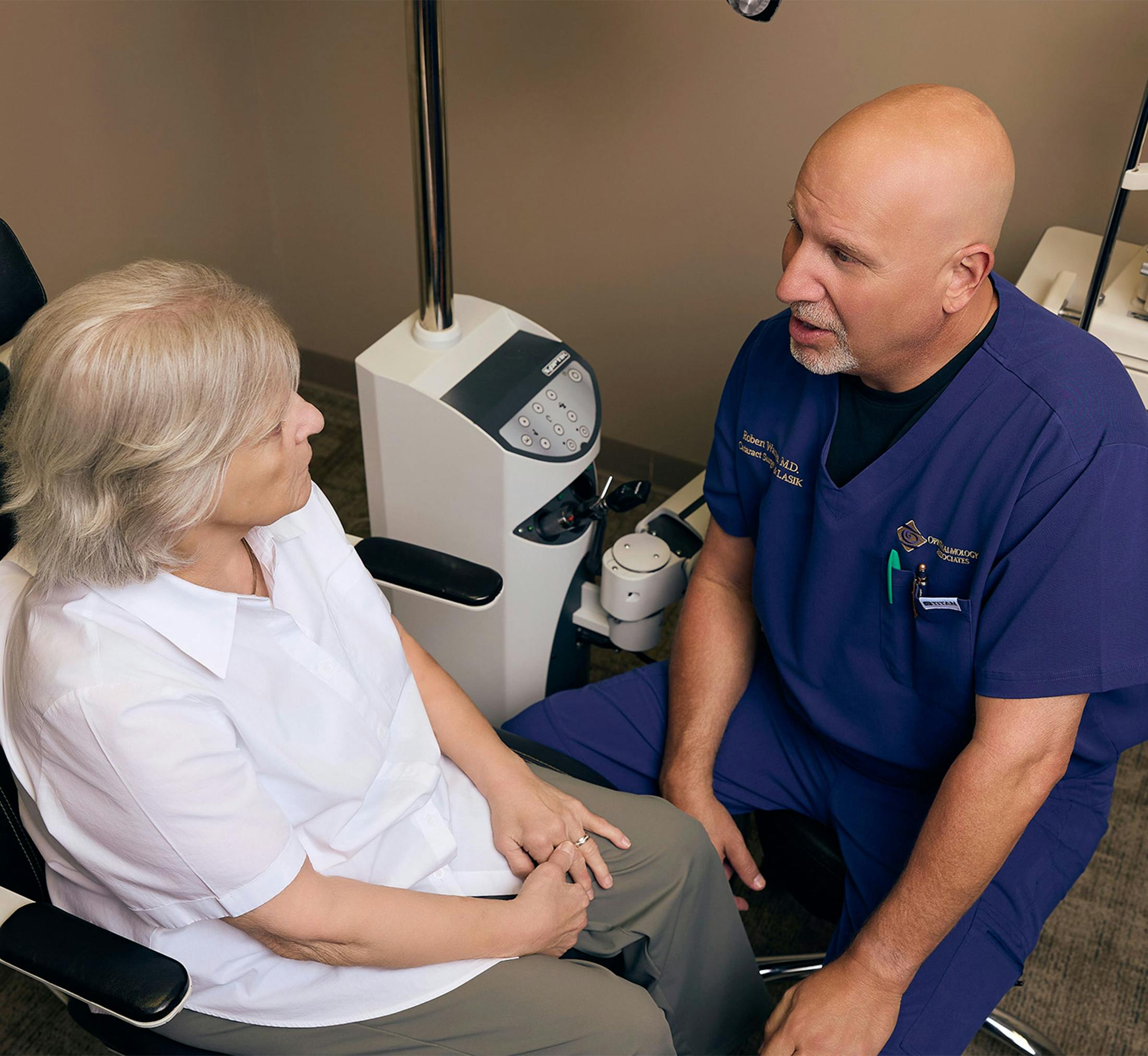 woman and doctor during eye exam