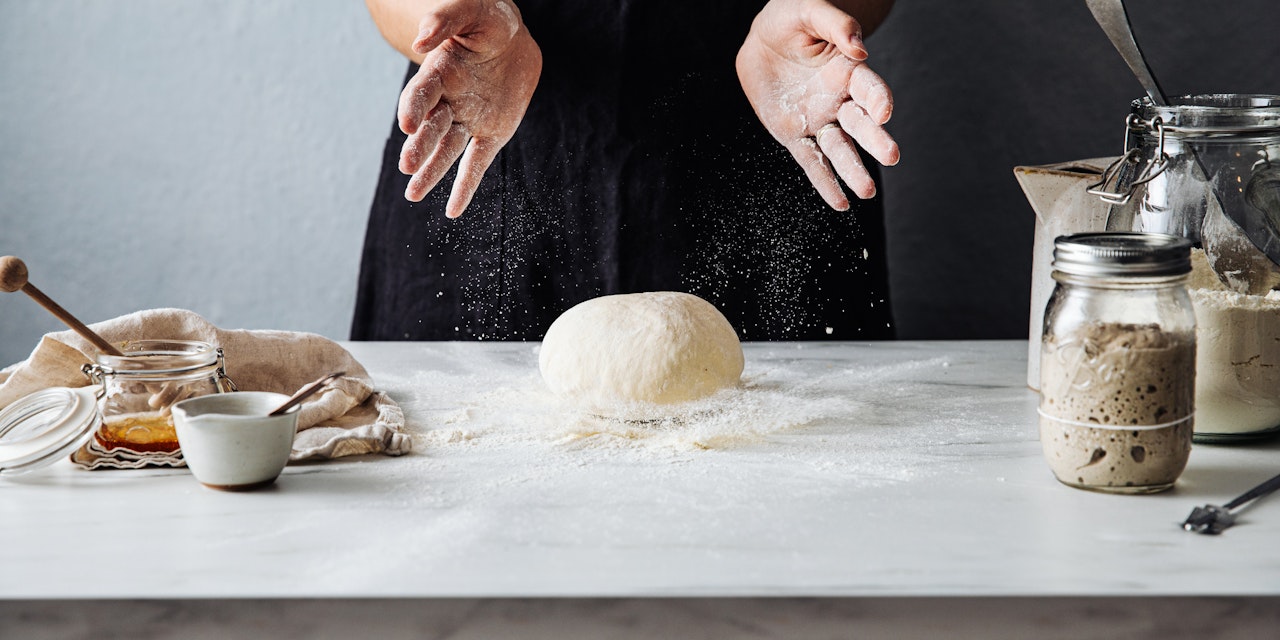 Person making a homemade bread