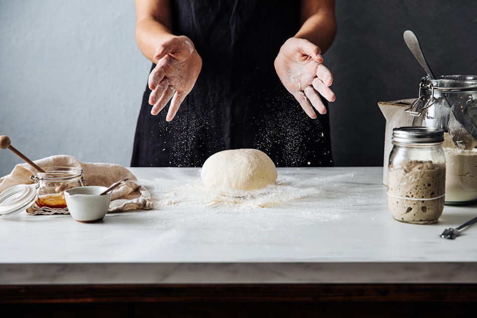 Person making a homemade bread