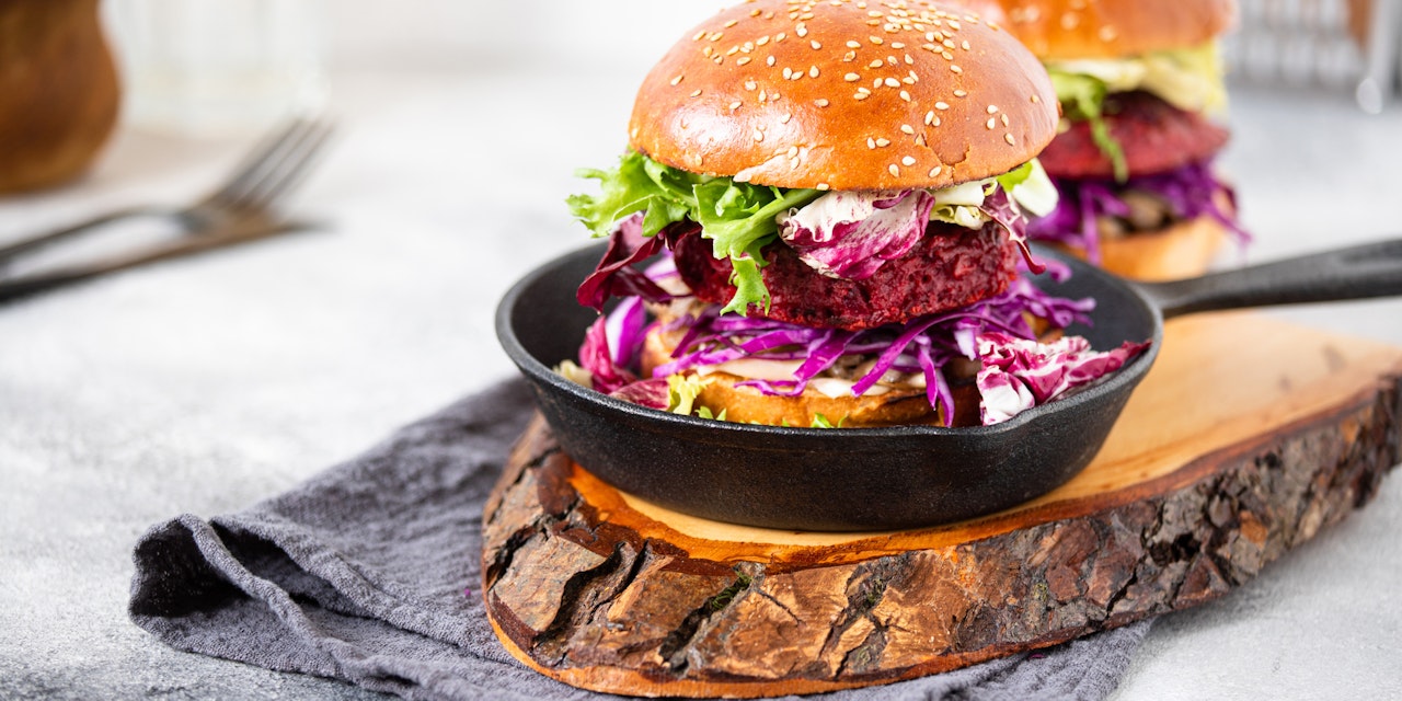 Healthy vegan beetroot burgers with red cabbage and lettuce