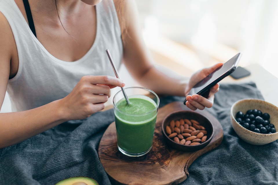 Woman tracking her breakfast meal on Lifesum