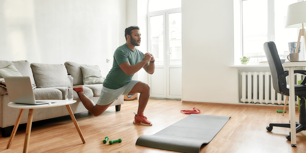 Exercise releases endorphins Man exercising at home