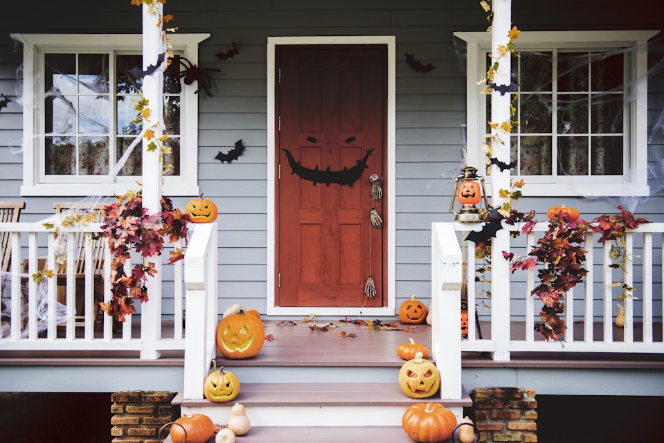 Halloween decorations adorn a porch