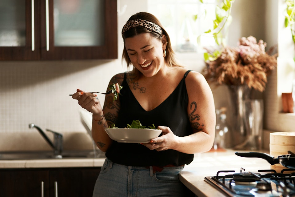 Woman happy about her balanced meal