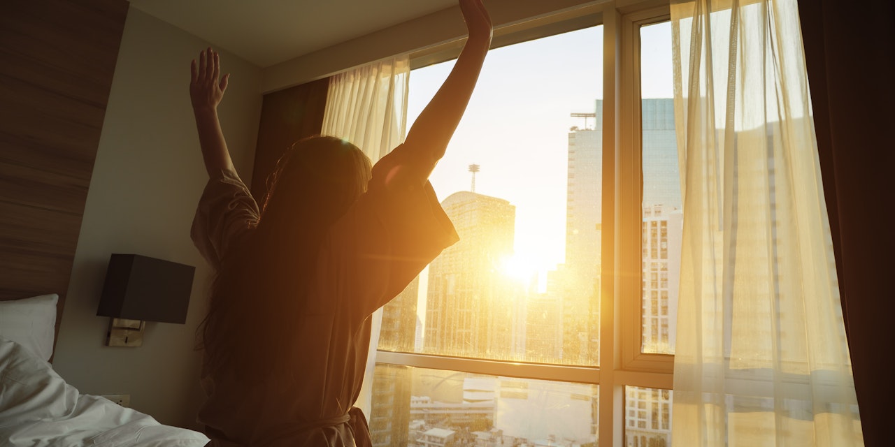 Rest is important for your health Woman waking up