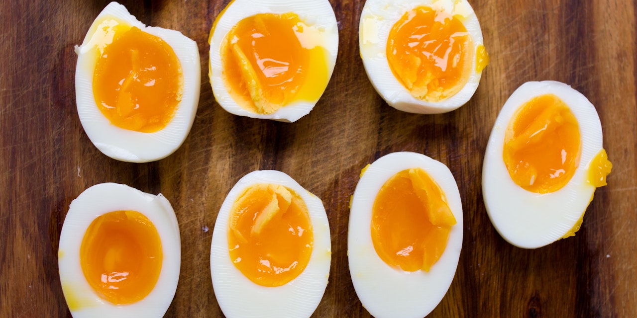 Two white and brown eggs art, Peeled Hard Boiled Eggs transparent