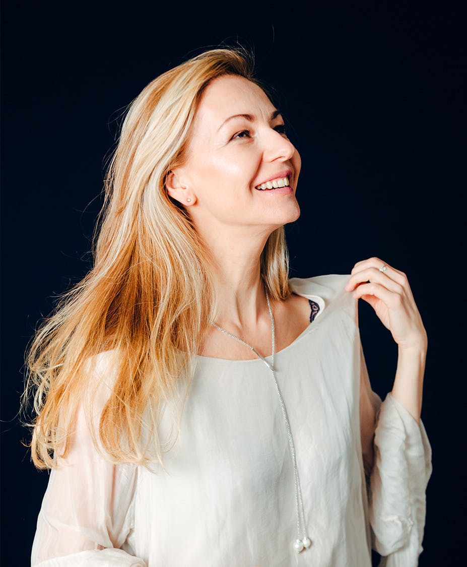 Woman smilling looking upwards