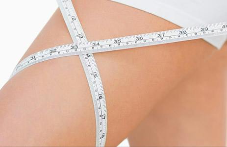 tape measure around a leg