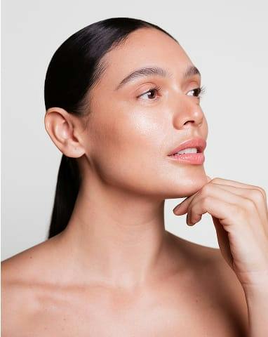 woman touching her chin