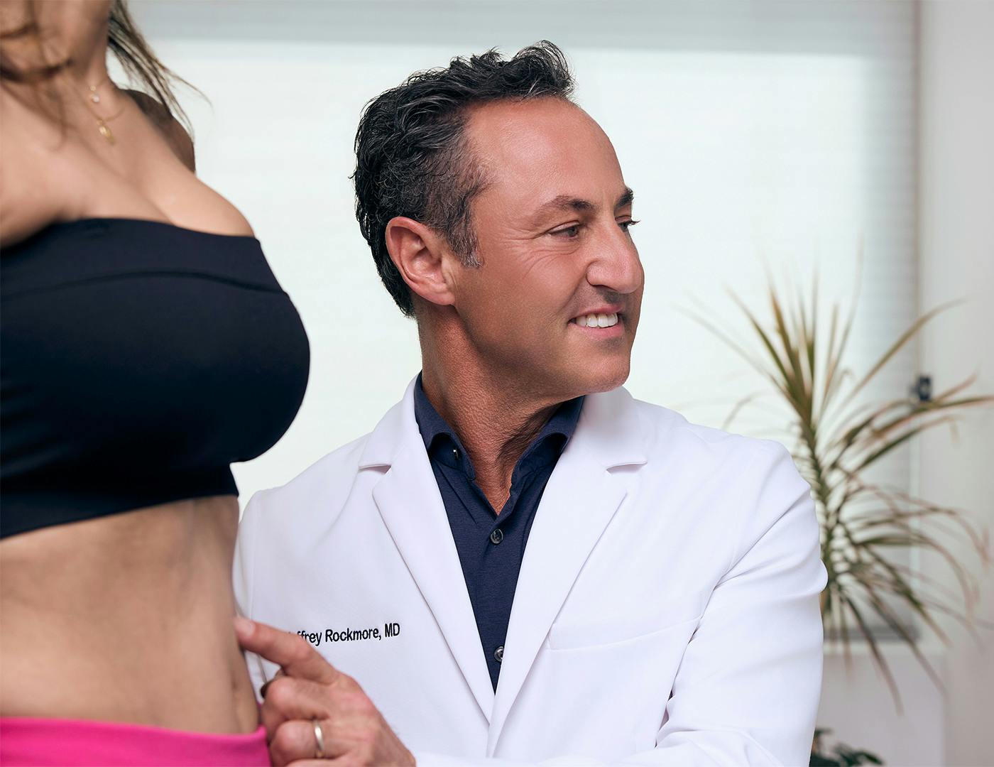 A dcotor helping a patient