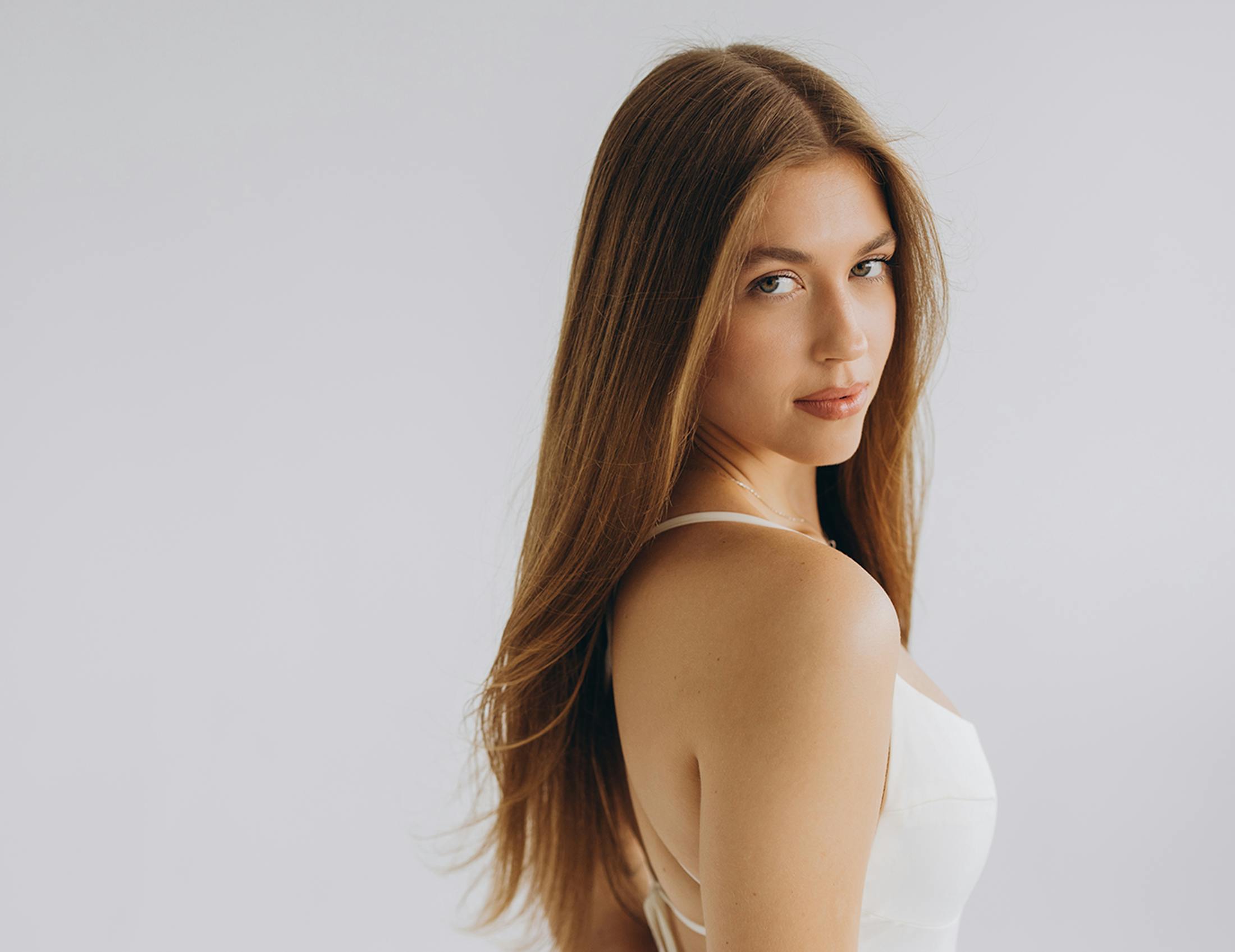 Woman looking over her shoulder