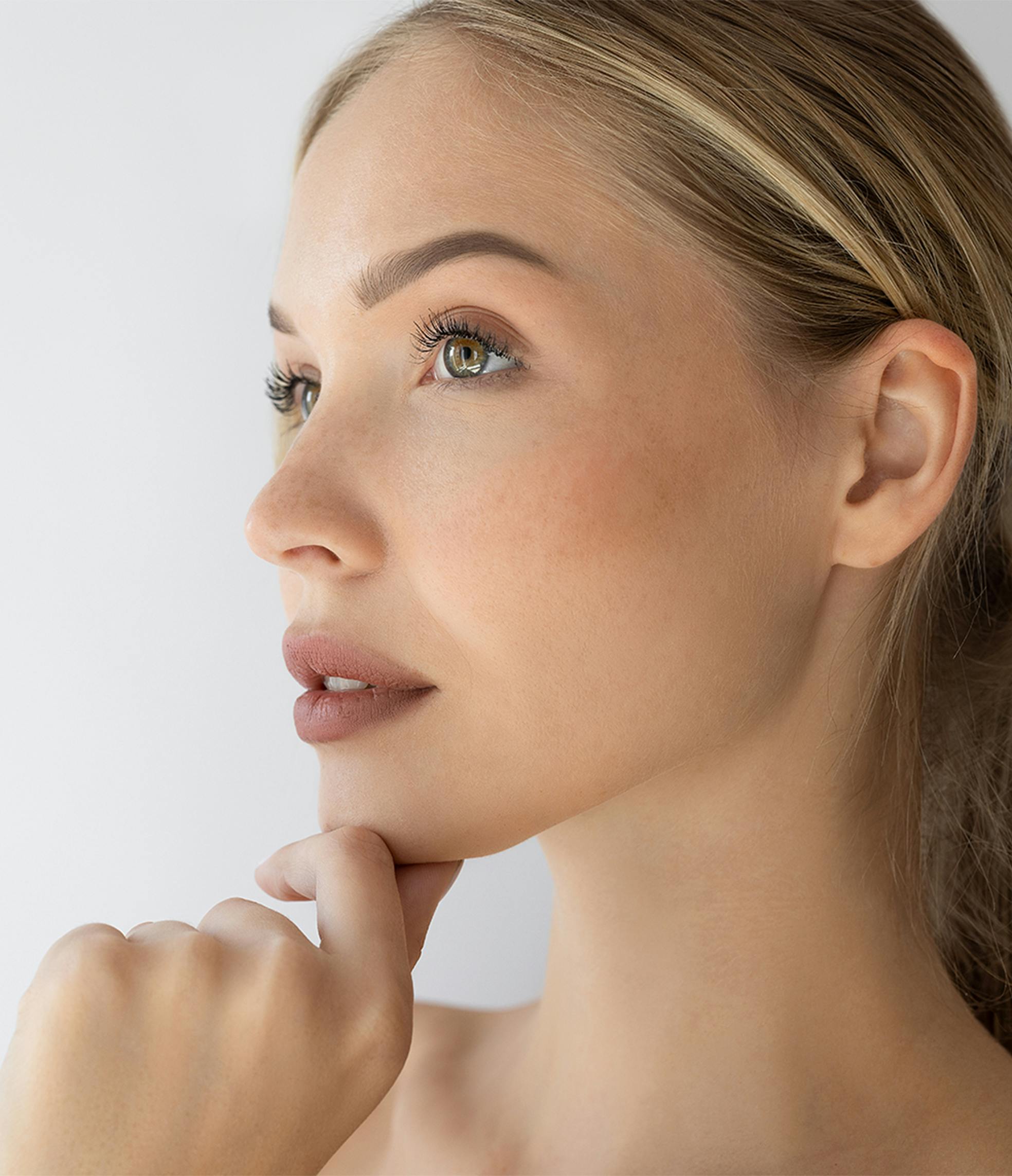 Woman touching her chin