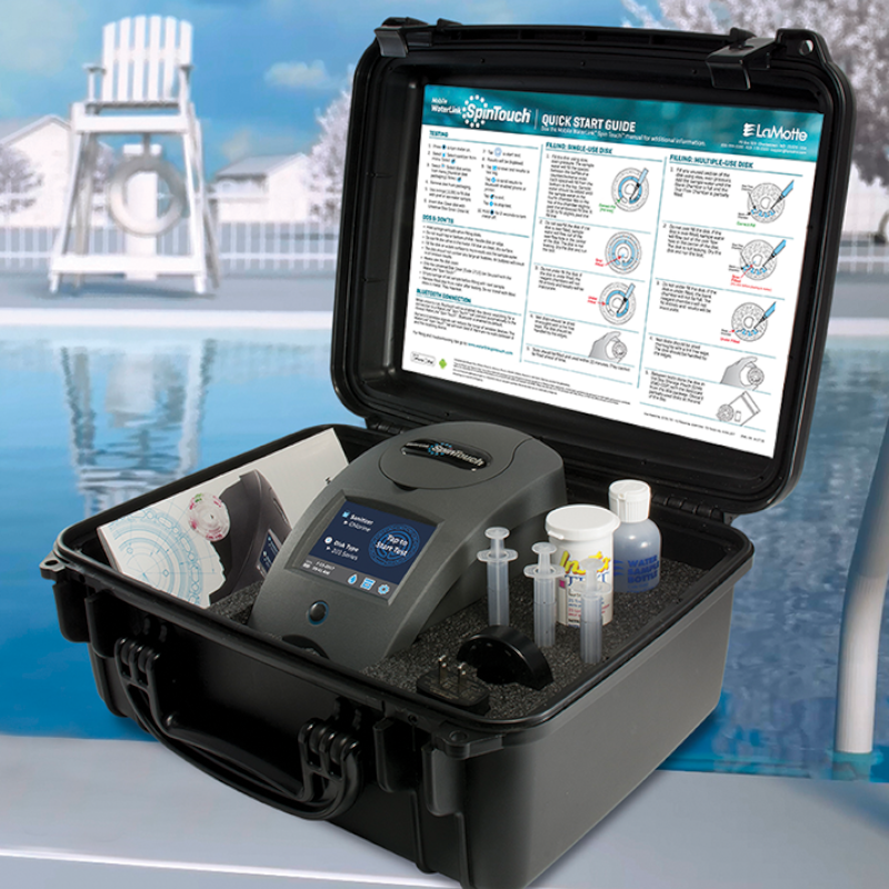 LaMotte WaterLink Spin Touch water testing kit beside a pool