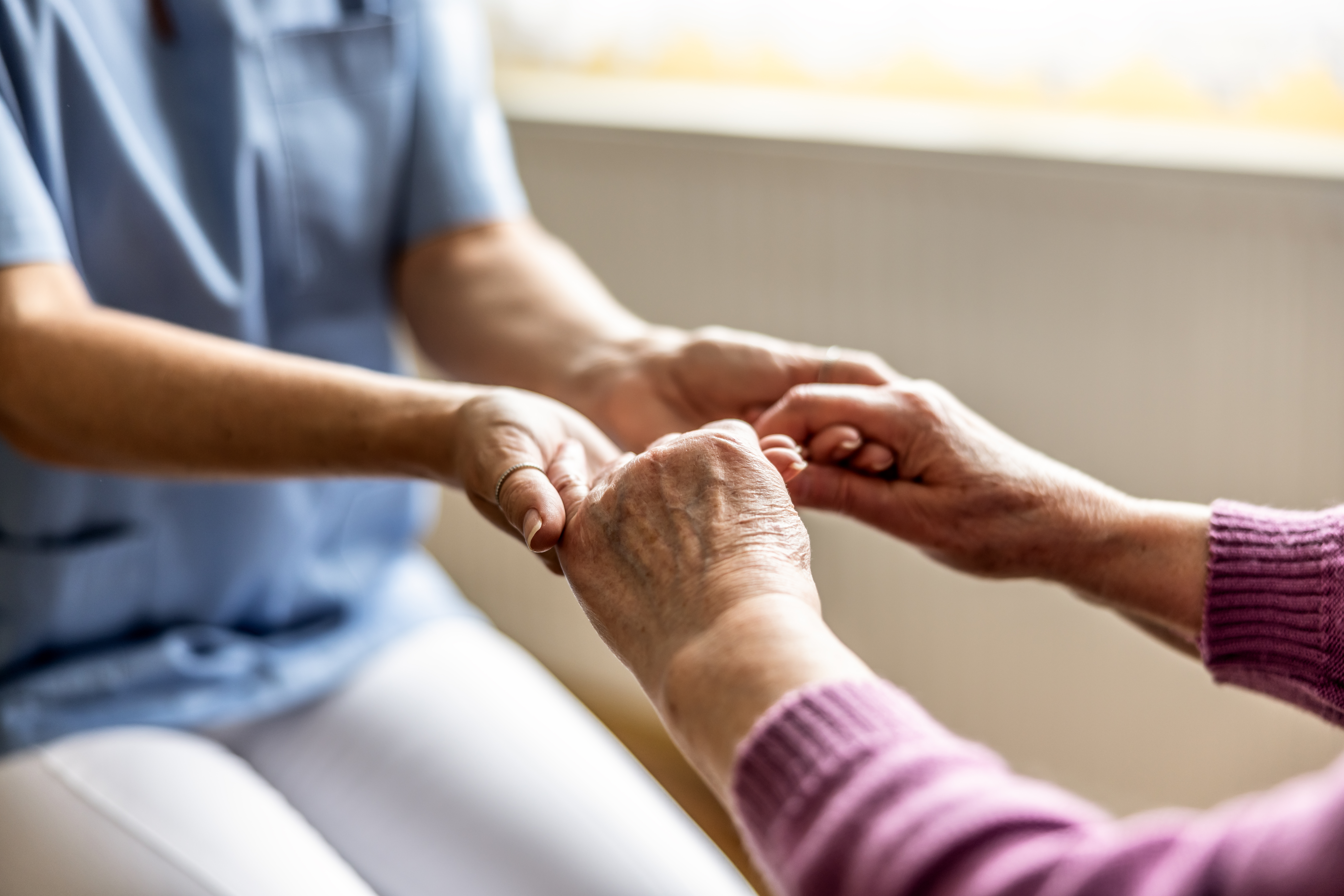 Elderly Care Holding Hands