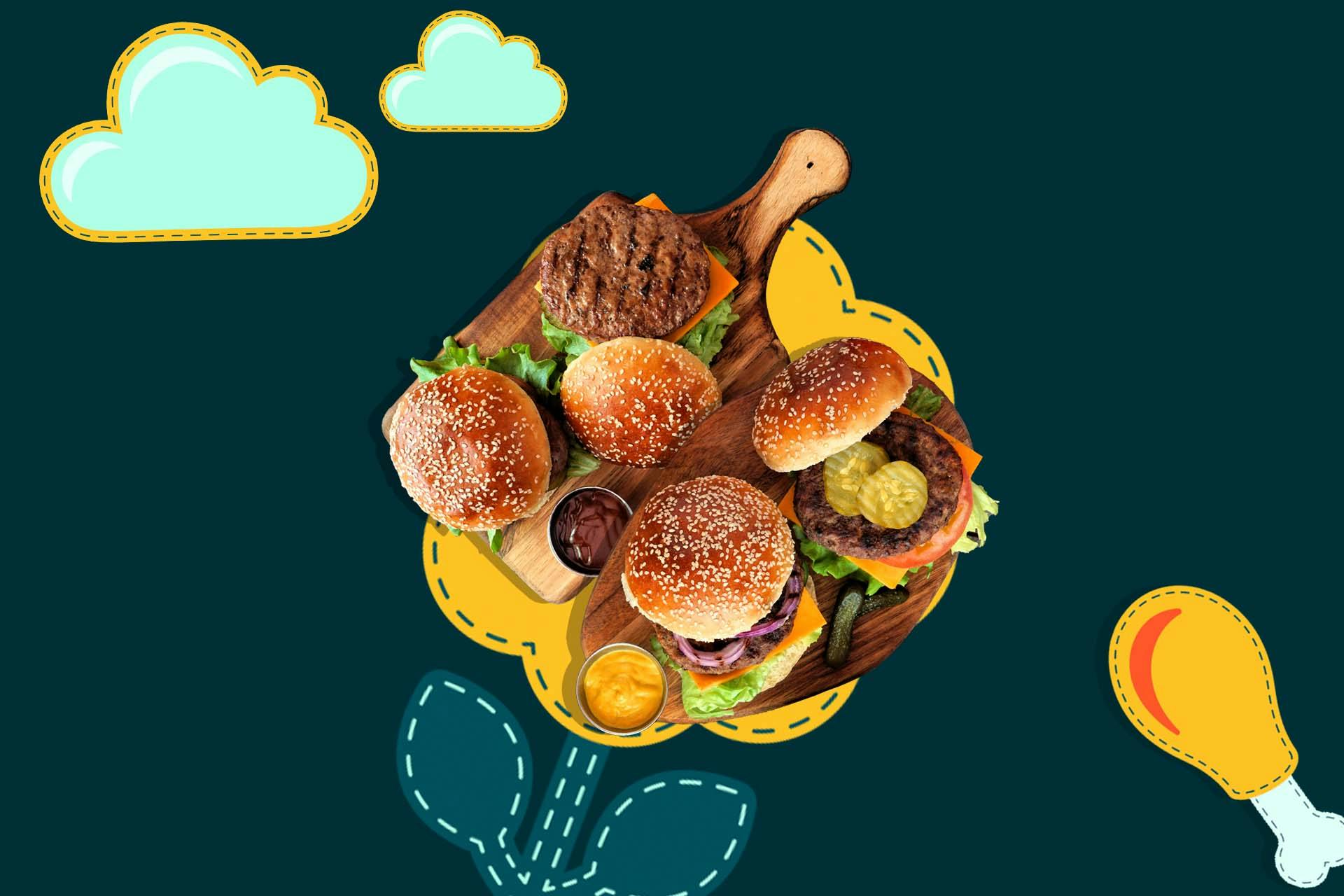 Vier Burger auf einer Servierplatte