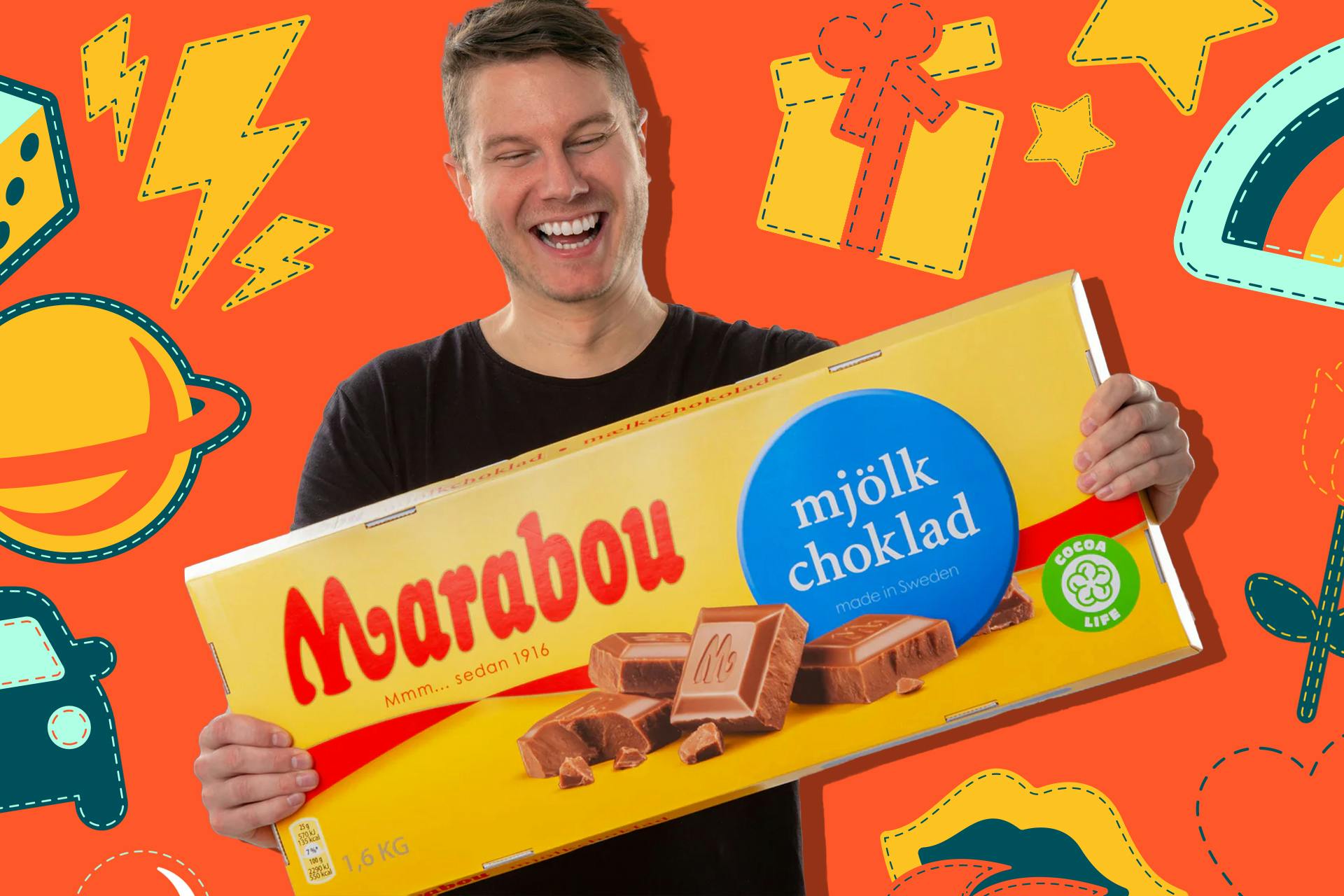 En glad mand, der fik en kæmpe chokoladepakke i gave